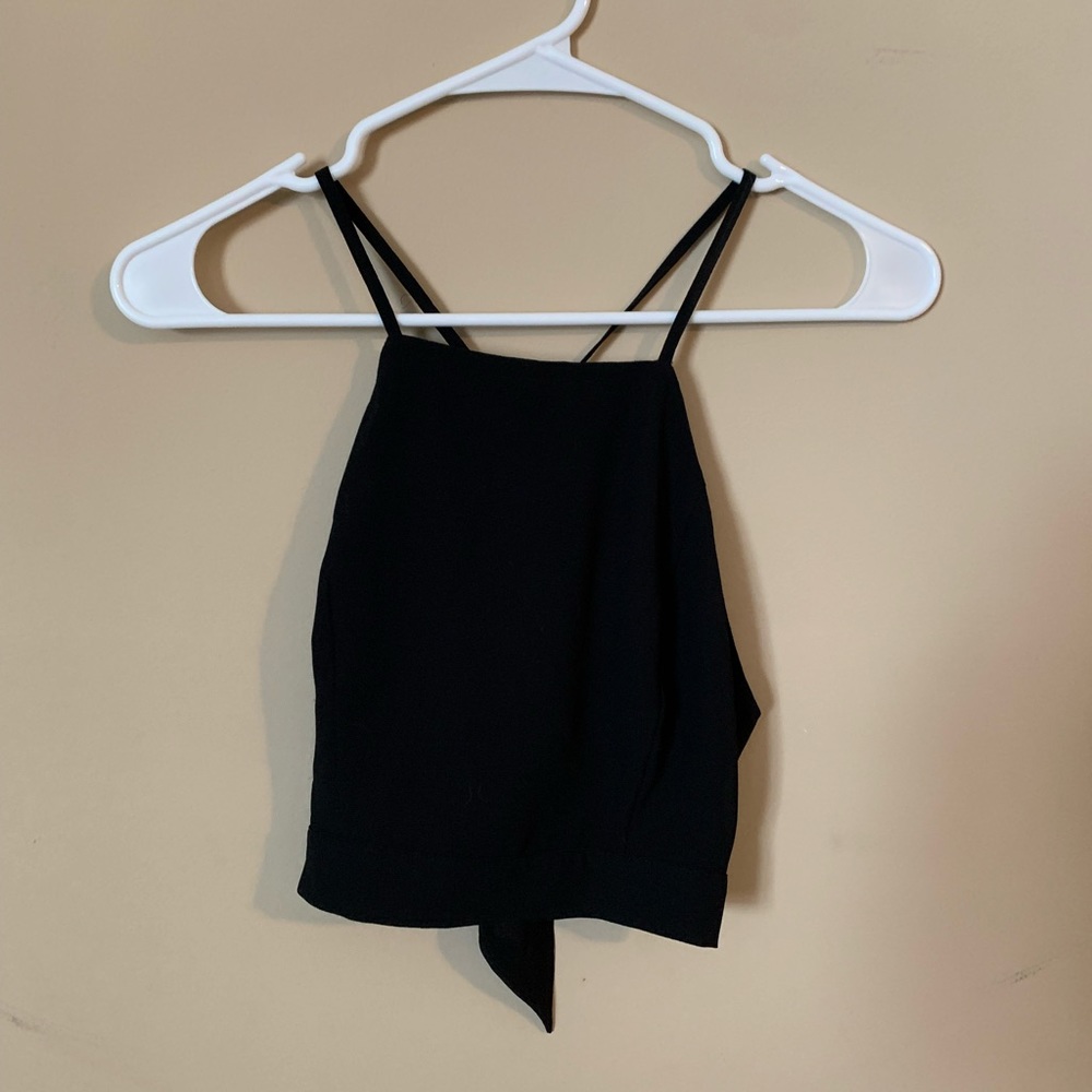 Black jumpsuit with silver beading. Never worn.